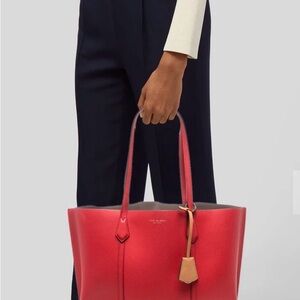Tory Burch, red exterior, tan interior leather tote. Excellent condition.